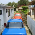 outside rooms 16, 17 cars park at Ifafa Beach Hotel