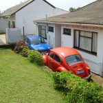 outside rooms 16, 17 cars park at Ifafa Beach Hotel.jpg 2